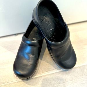 Dansko black leather clogs